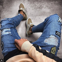 Load image into Gallery viewer, Men's Ripped jeans Badge Letters Hip-hop Skinny Jogging Denim Fashion Pencil Long Trousers Distressed Jeans For Men Clothing - nevaehshalo