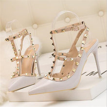 Load image into Gallery viewer, New 10CM woman Sexy nightclub stiletto heels patent-leather metallic rivet hollow Roman fashion sandals - nevaehshalo