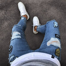 Load image into Gallery viewer, Men's Ripped jeans Badge Letters Hip-hop Skinny Jogging Denim Fashion Pencil Long Trousers Distressed Jeans For Men Clothing - nevaehshalo
