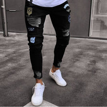 Load image into Gallery viewer, Men's Ripped jeans Badge Letters Hip-hop Skinny Jogging Denim Fashion Pencil Long Trousers Distressed Jeans For Men Clothing - nevaehshalo